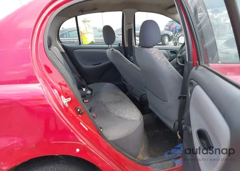 2001 Toyota Echo z USA, uszkodzony, nr VIN JTDBT123610123655